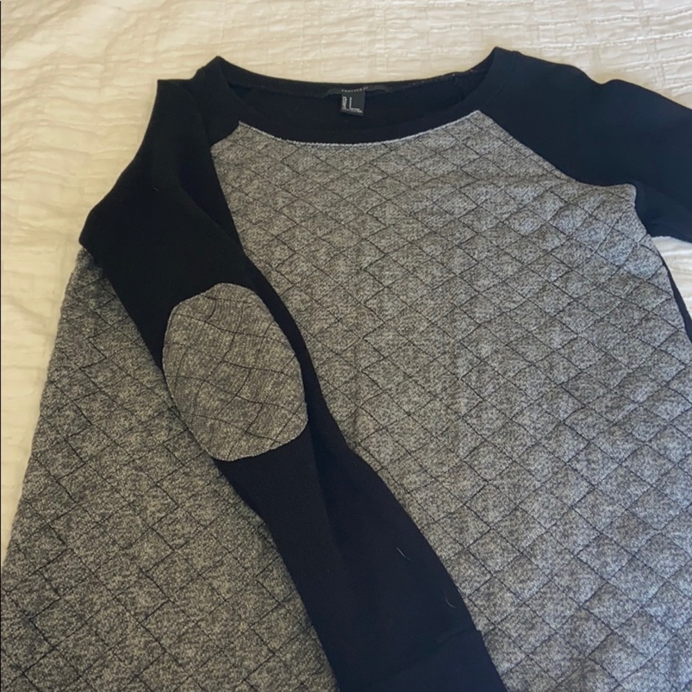 Black and grey sweater with elbow patches
